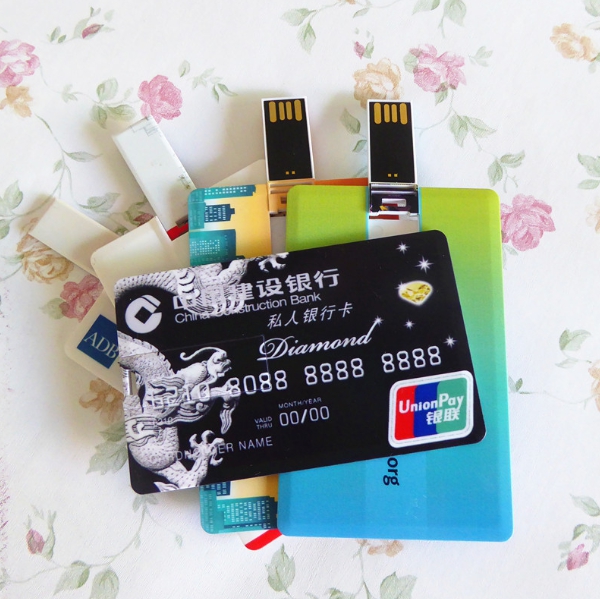 รับผลิต สกรีน แฟลชไดร์ฟ (FLASH DRIVE) พร้อมสกรีนโลโก้